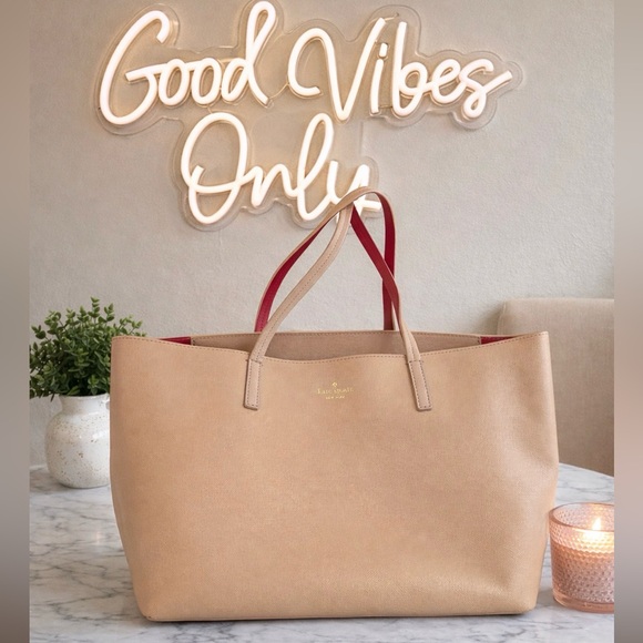 kate spade Handbags - Kate Spade Beige Tote with Red Interior